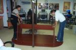 students taking apart the conference table