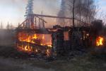 Fire engulfs an old cabin
