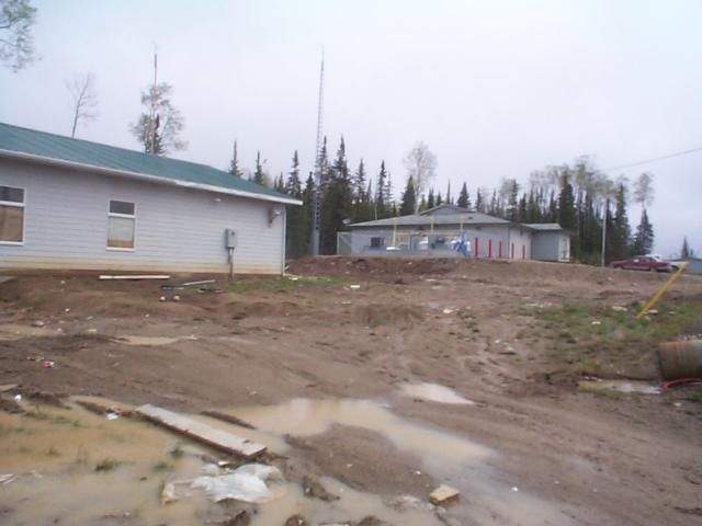 on the left is our community hall/ library and radio station. Further up is our Health Centre and in the centre up front is our