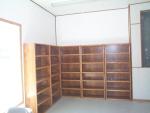 getting the shelves ready to see which room it will fit in