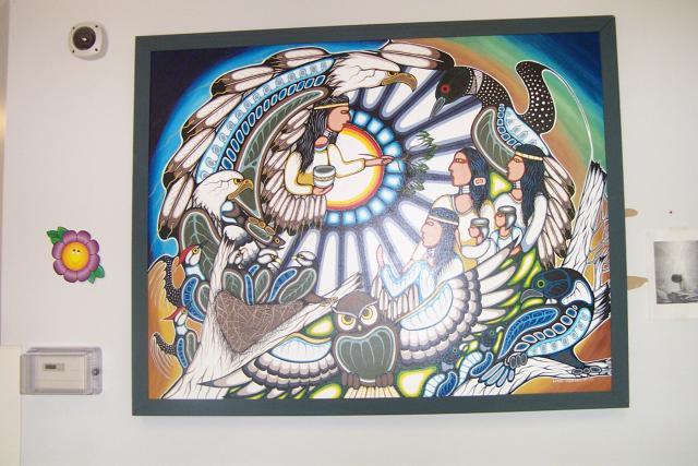 This one is done by Lloyd Kakepetum which hangs by the entrance of the Health Centre.
