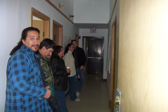 Some members standing in the hall while prayers were being said