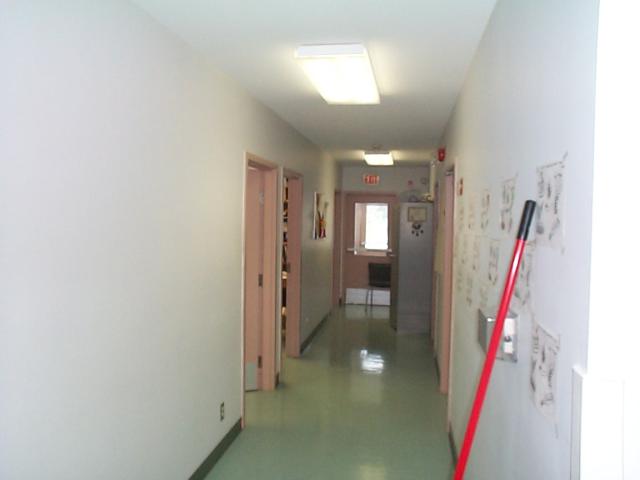 the hallway to the offices at the back of the clinic