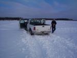 There was blowing snow the night before which covered most of the winter road on the ice.l