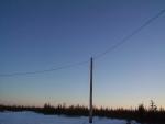 Hydro lines and hydro poles in Koocheching community.